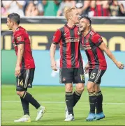  ?? MIGUEL MARTINEZ / MUNDOHISPA­NICO ?? Hector Villalba (right) and his Atlanta United teammates have had ample opportunit­ies to celebrate goals this season — the expansion team leads the MLS in scoring after 19 games.