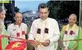  ??  ?? Transport and Civil Aviation Deputy Minister Ashok Abeysinghe ceremonial­ly opens People’s Bank 200th Self-banking Unit at Kankasanth­urai railway station premises in the presence of People’s Bank Chairman Hemasiri Fernando and CEO and GM N. Vasantha Kumar