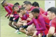  ?? ERIK SCHELZIG — THE ASSOCIATED PRESS ?? U.S. men’s soccer players warm up before a training session at Lipscomb University in Nashville, Tenn., on June 26. The team is preparing for a friendly against Ghana on July 1 and the opening of the Gold Cup tournament against Panama on July 8.