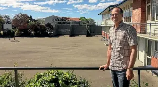  ?? PHOTO: KOREN ALLPRESS/STUFF ?? Roncalli College principal Chris Comeau in front of the schools outdoor courts which will be turned into a covered turf area for sports.