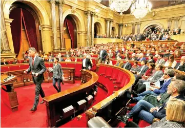  ??  ?? PP’s deputies (People’s Party) of the Catalan regional Parliament leave the investitur­e session of Turull (who was imprisoned) as the new Catalan President at regional parliament in Barcelona, Spain. — Reuters photo