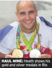  ??  ?? HAUL MINE: Heath shows his gold and silver medals in Rio