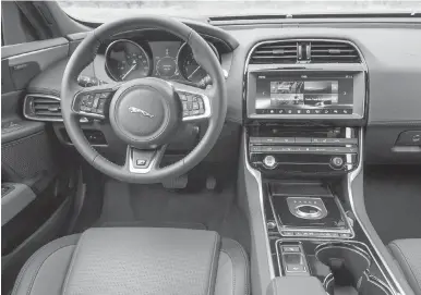  ?? JAGUAR ?? The XE’s interior is typical Jaguar — refined and well-designed, with first-class materials.