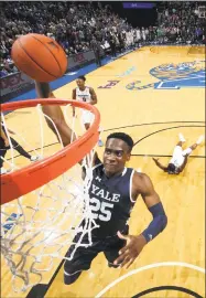  ?? Joe Murphy / Getty Images ?? Yale’s Miye Oni dunks against Memphis on Nov. 17 at FedEx Forum in Memphis, Tennessee.