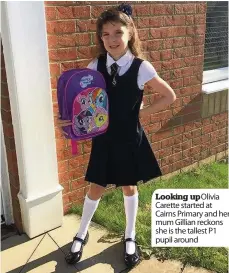 ??  ?? Looking up Olivia Carette started at Cairns Primary and her mum Gillian reckons she is the tallest P1 pupil around