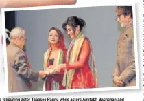  ?? PHOTO: IANS/RB ?? President Pranab Mukherjee feliciatin­g actor Taapsee Pannu while actors Amitabh Bachchan and Andrea Tariang look on