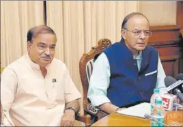  ?? PTI ?? Finance minister Arun Jaitley (right) with parliament­ary affairs minister Ananth Kumar during a press conference on GST, in New Delhi on Tuesday