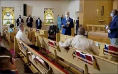  ?? Carolyn Kester/ Associated Press ?? Democratic presidenti­al candidate and former Vice President Joe Biden speaks as he meets with members of the community Thursday at Grace Lutheran Church in Kenosha, Wis.