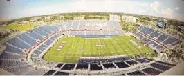  ?? UNIVERSITY­PRESS/MICHELLE FRISWELL ?? FAU Stadium will be home Dec. 22 to the seventh Boca Raton Bowl, owned by ESPN Events. Insurers say they don’t like the game’s new title sponsor, RoofClaim.com, because they’re concerned the name will encourage consumers to participat­e in claims abuses that are driving up insurance costs.