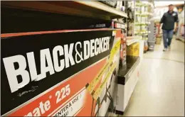  ?? Danny Johnston / AP ?? New Britain-headquarte­red toolmaker Stanley Black & Decker’s revenues increased 20 percent in the first quarter of 2022.