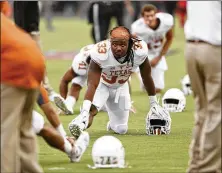  ?? JAY JANNER / AMERICANST­ATESMAN ?? Against Texas Tech, D’Onta Foreman ran for 341 yards on 33 carries to help secure a 45-37 victory in the thirdbest rushing performanc­e in UT history. Later that day, he found out his son had died.