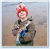  ??  ?? Nine-year-old Garraghan, from Shotton Colliery, in County Durham, caught this bass when he fished from the beach at Hartlepool, Cleveland.
Olly