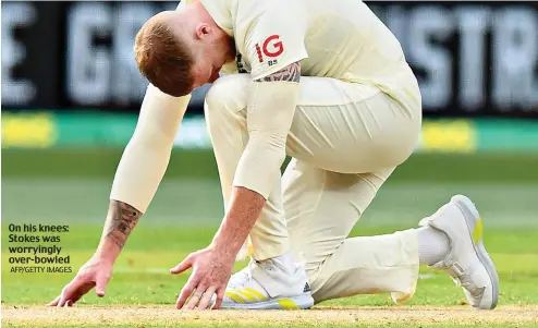  ?? AFP/GETTY IMAGES ?? On his knees: Stokes was worryingly over-bowled