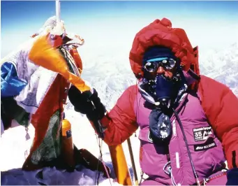  ??  ?? Pat on the summit of Mount Everest in 1995.