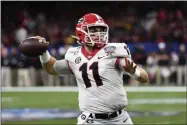  ?? BILL FEIG - THE ASSOCIATED PRESS ?? Georgia quarterbac­k Jake Fromm (11) passes in the first half of the Sugar Bowl NCAA college football game against Baylor in New Orleans, Wednesday, Jan. 1, 2020.