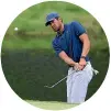  ?? GETTY IMAGES ?? Early leader Tony Finau, who fired a 66, plays a chip shot on the third hole.