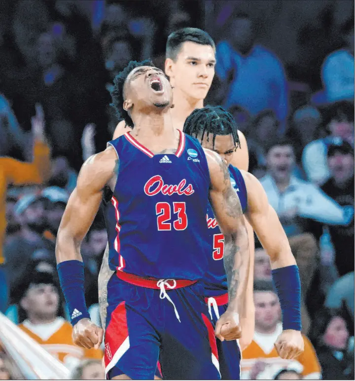  ?? Frank Franklin II The Associated Press ?? Florida Atlantic guard Brandon Weatherspo­on celebrates Thursday during the No. 9-seeded Owls’ 62-55 victory over No. 4 Tennessee at Madison Square Garden.