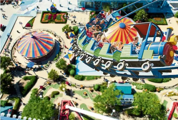  ??  ?? A theme park holiday offers endless activities and rides to keep your kids (and you) entertaine­d and occupied.