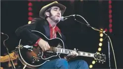  ?? David Redfern Redferns/Getty Images ?? ‘A BALM IN TROUBLESOM­E TIMES’ Don Williams, shown at a London concert in 1982, had several No. 1 hits but toured sparingly, did few interviews and spent much of his time on his farm.