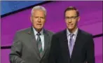  ?? JEOPARDY PRODUCTION­S, INC. ?? Jeopardy! host Alex Trebek, left, with contestant Nick Spicher, who was ruled to incorrectl­y pronounced the title of the Coolio song "Gangsta’s Paradise."