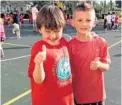  ?? PHOTO BY SARA SHELL ?? Kindergart­ners Charles Artus, left, and Luigi Landi were among the participan­ts in the annual Hollywood Central Elementary School Heart Run.