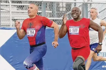  ?? Associated Press file photos ?? Anthony Hinojosa of California, left, sprints to the finish line as Ronald Flanders of North Carolina tries to catch up during a race at the National Senior Games in May in Miramar, Fla.