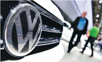  ?? JOHN MACDOUGALL/AFP/GETTY IMAGES ?? The EU Commission says it received informatio­n that BMW, Daimler, Volkswagen and VW units Audi and Porsche held talks to discuss clean technologi­es for limiting car emissions.