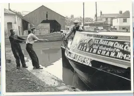  ?? PHOTO: AUBREY BERRIMAN COLLECTION ?? As it was: the quayside in June 1958 at the time of the launch of the Raymond. One of the rollers for the boat launches – at the bottom right of the picture – was recovered in the rebuilding of the wall in 1995 and is now incorporat­ed into the new adjoining concrete walkway, with its pair.