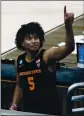  ?? JEFF ROBERSON — THE ASSOCIATED PRESS ?? Oregon State guard Ethan Thompson celebrates after a Sweet 16 game against Loyola Chicago in the NCAA Tournament at Bankers Life Fieldhouse on Saturday in Indianapol­is. Oregon State won 65-58.