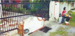  ??  ?? ... A house owner is living in fear after the wall of his home in Menglembu, Malacca, was smashed by passing vehicles more than seven times in three years, with the latest incident occuring on Wednesday. Located at a corner, Wong Fook Wei, 50, said...