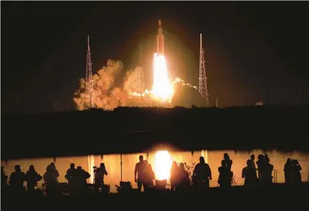  ?? JOE BURBANK/ORLANDO SENTINEL ?? NASA’s Artemis I lifts off from launch pad 39-B at Kennedy Space Center carrying the Orion spacecraft on a mission to orbit the moon early on Nov. 16. The longdelaye­d mission gave NASA a win last year, according to an associate administra­tor at the agency.