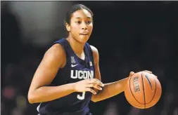  ?? Mark Zaleski / Associated Press ?? Megan Walker’s decision to go pro was one of the items Geno Auriemma and Rebecca Lobo discussed during a chat on Instagram Live.