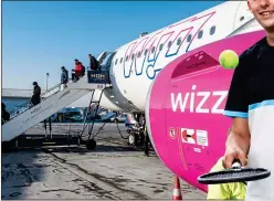  ??  ?? GEE WIZZ: Vee Pitchley booked a flight for her son Tom, right, with Wizz Air but was hit with currency conversion fees