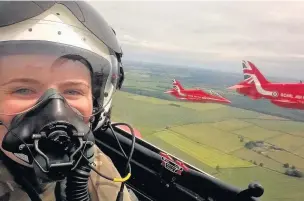  ??  ?? ●● Macclesfie­ld air cadet Emily Bethell touched down at the world’s biggest airshow in a thrilling flight with the Red Arrows