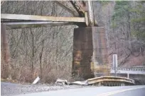  ?? STAFF PHOTO BY BEN BENTON ?? The guardrail and concrete bridge foundation along State Route 134 in Marion County, Tenn., on Jan. 11, show damage from a crash involving William John Berner’s pickup truck on Dec. 27.