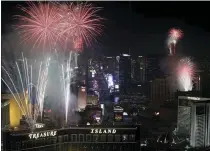  ?? ASSOCIATED PRESS FILE PHOTO ?? Fireworks explode over the Las Vegas Strip during a previous New Year’s Eve celebratio­n.