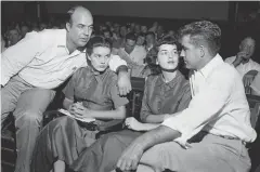  ??  ?? WE’VE GOT IT LICKED: In this Sept. 23, 1955, file photo, J W Milam, left, his wife, second left, Roy Bryant, far right, and his wife, Carolyn Bryant, sit in a courtroom in Sumner, Miss.