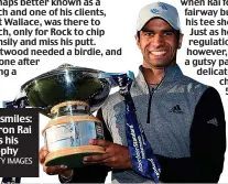  ?? GETTY IMAGES ?? All smiles: Aaron Rai lifts his trophy