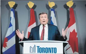  ?? NATHAN DENETTE THE CANADIAN PRESS ?? Toronto Mayor John Tory speaks during a news conference on Wednesday about the court’s stay of an earlier court ruling, returning the city’s upcoming Oct. 22 election to a 25-ward race.