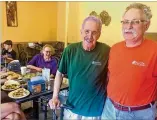  ?? BILL TORPY / AJC ?? Manny Klein (left) and Joe Weiner, owners of the Bagel Palace for 25 years at the Toco Hill Shopping Center, closed the business this month after rent increases.