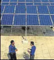  ?? MINT/FILE ?? India’s solar power tariff fell to a record ₹2.44 per kilowatt hour (kwh) in May before firming up to ₹2.65 per kwh in an auction by the Gujarat government last month