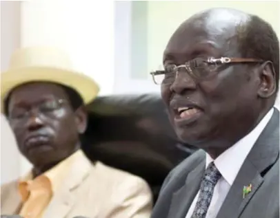  ??  ?? South Sudan’s Foreign Minister Barnaba Marial Benjamin speaks during a press conference with Interior minister Aleu Ayienyi Aleu (L), in Juba, South Sudan.