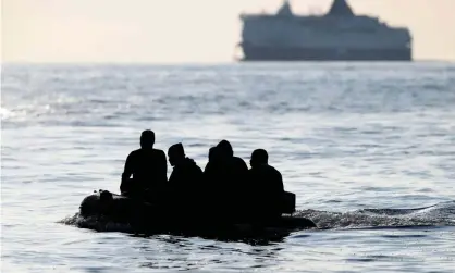  ?? Photograph: Peter Nicholls/Reuters ?? Migrants claiming to be from Darfur, Sudan crossing the Channel in an inflatable boat near Dover.