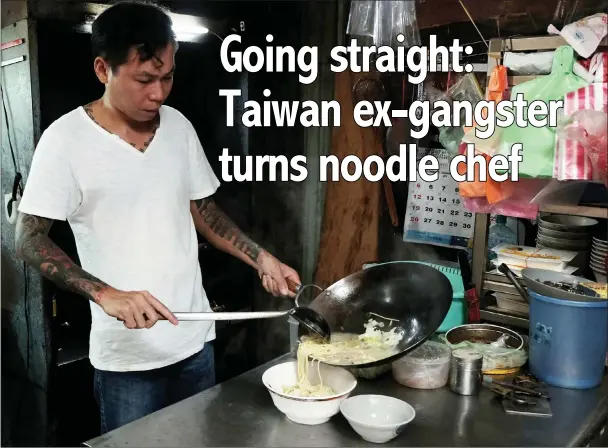  ?? AFP photos ?? Yen Wei-shun, a former criminal turned noodle shop owner for charity, preparing food at his noodle shop in Panchiao district, New Taipei City. —