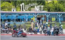  ??  ?? NEPTUNE’S NET, a seafood roadhouse, is a friendly gathering place with a stunt show: bikers popping wheelies as they roar out.