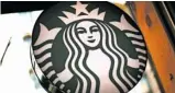  ?? AP ?? Walk-in customers at Starbucks will be required to wear masks starting July 15.