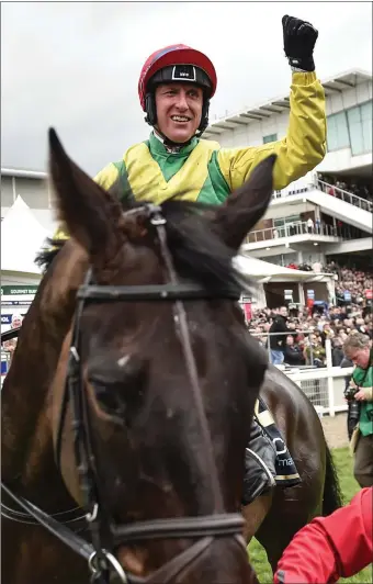  ??  ?? Jubilant jockey Robbie Power after winning the Cheltenham Gold Cup on Sizing John.