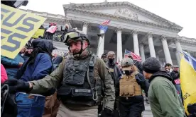  ?? Photograph: Jim Bourg/Reuters ?? Members of the Oath Keepers are seen among the mob that attacked the Capitol on 6 January.