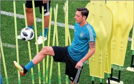  ??  ?? All the skills: Mesut Ozil is a gifted player but has drawn criticism in his homeland