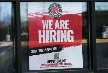  ?? NAM Y. HUH — THE ASSOCIATED PRESS ?? A hiring sign is displayed at a restaurant in Rolling Meadows, Ill., Monday.